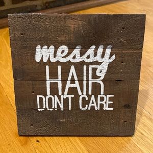 “Messy hair don’t care” sign